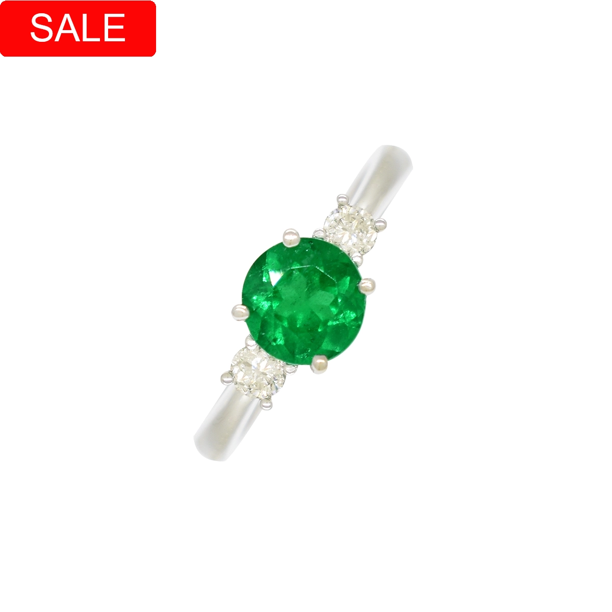 Emerald and diamond ring in 18K white gold with 1.05 carats round cut natural emerald and 0.14 carats t.w. in 2 round cut genuine diamonds