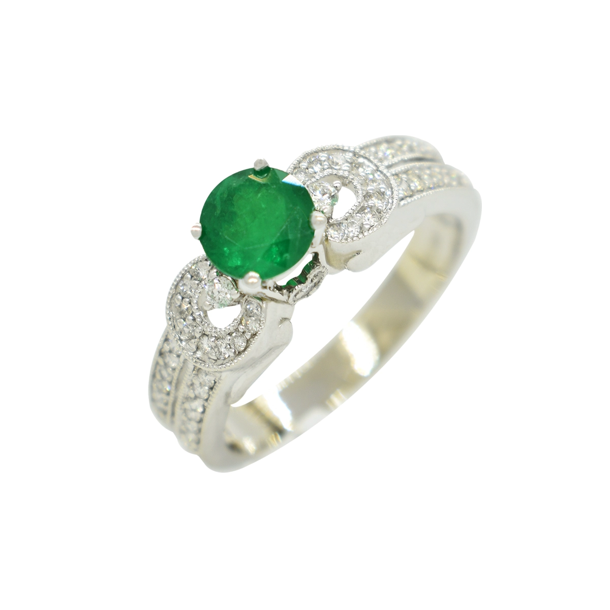 Emerald ring with diamond accents in 14K white gold with 0.67 Ct. natural Colombian emerald and 0.31 Ct. t.w. in 44 round cut small diamonds