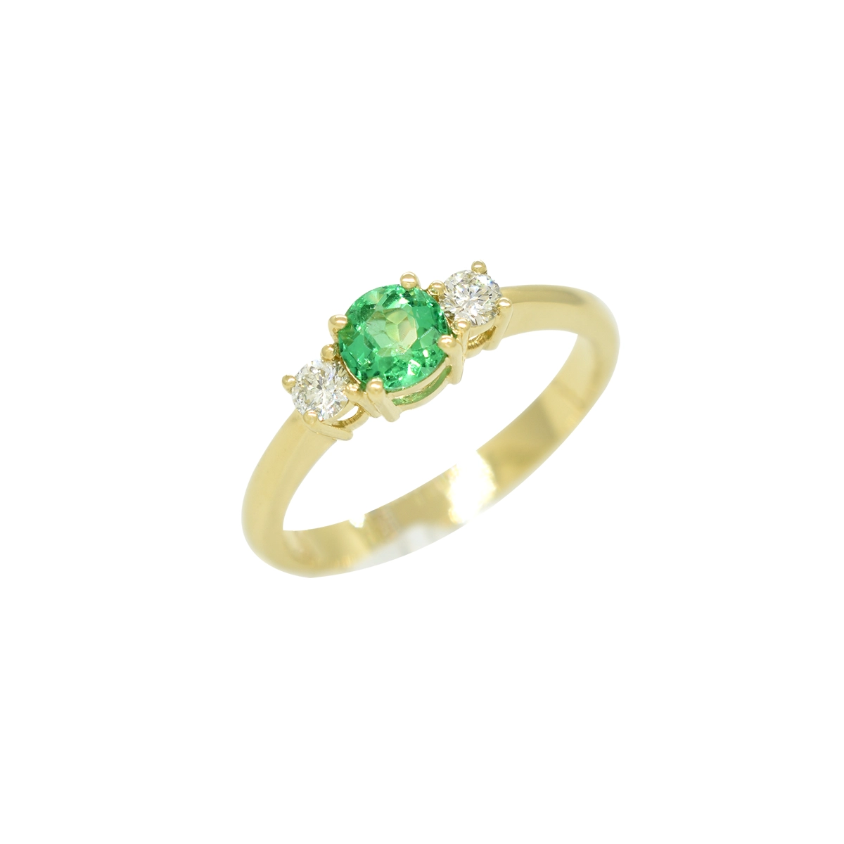 Small emerald and diamond ring in solid 18K gold with round natural Colombian emerald as the center stone flanked by 2 round cut diamonds set in fine prongs